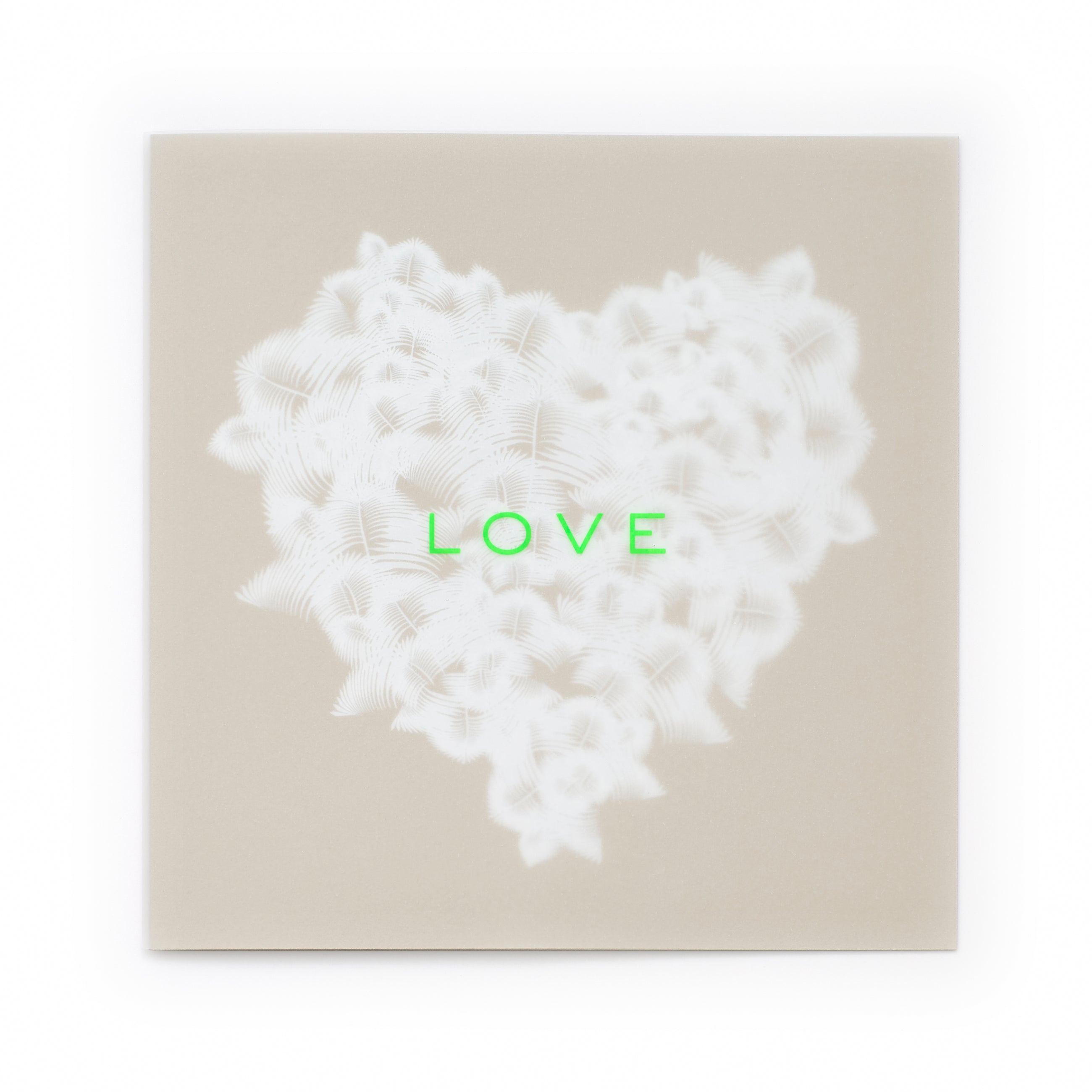 Greeting card with an elegant, understated design, featuring a textured white feather heart centered on a warm beige background, accented by bright neon-green “LOVE” text, shown flat against a clean white backdrop.
