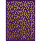 Wrapping paper with a festive pattern of golden gingerbread men and women scattered across a deep purple background.