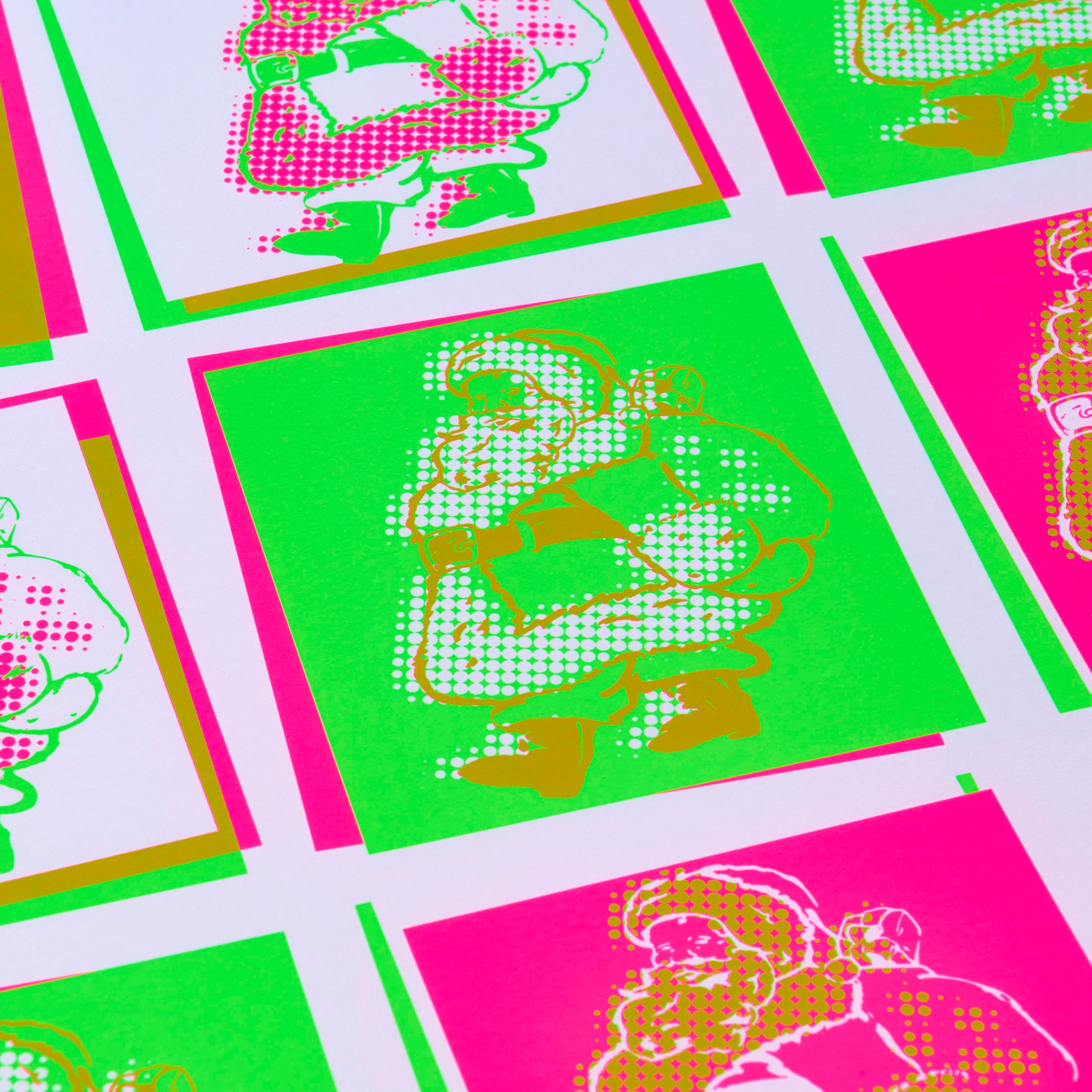Close-up of colorful wrapping paper featuring a pop art Santa Claus design in neon pink, green, and gold tones with a halftone print effect.