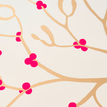 Wrapping paper with a festive pattern of golden mistletoe branches accented by bright pink berries on a soft cream-white background.