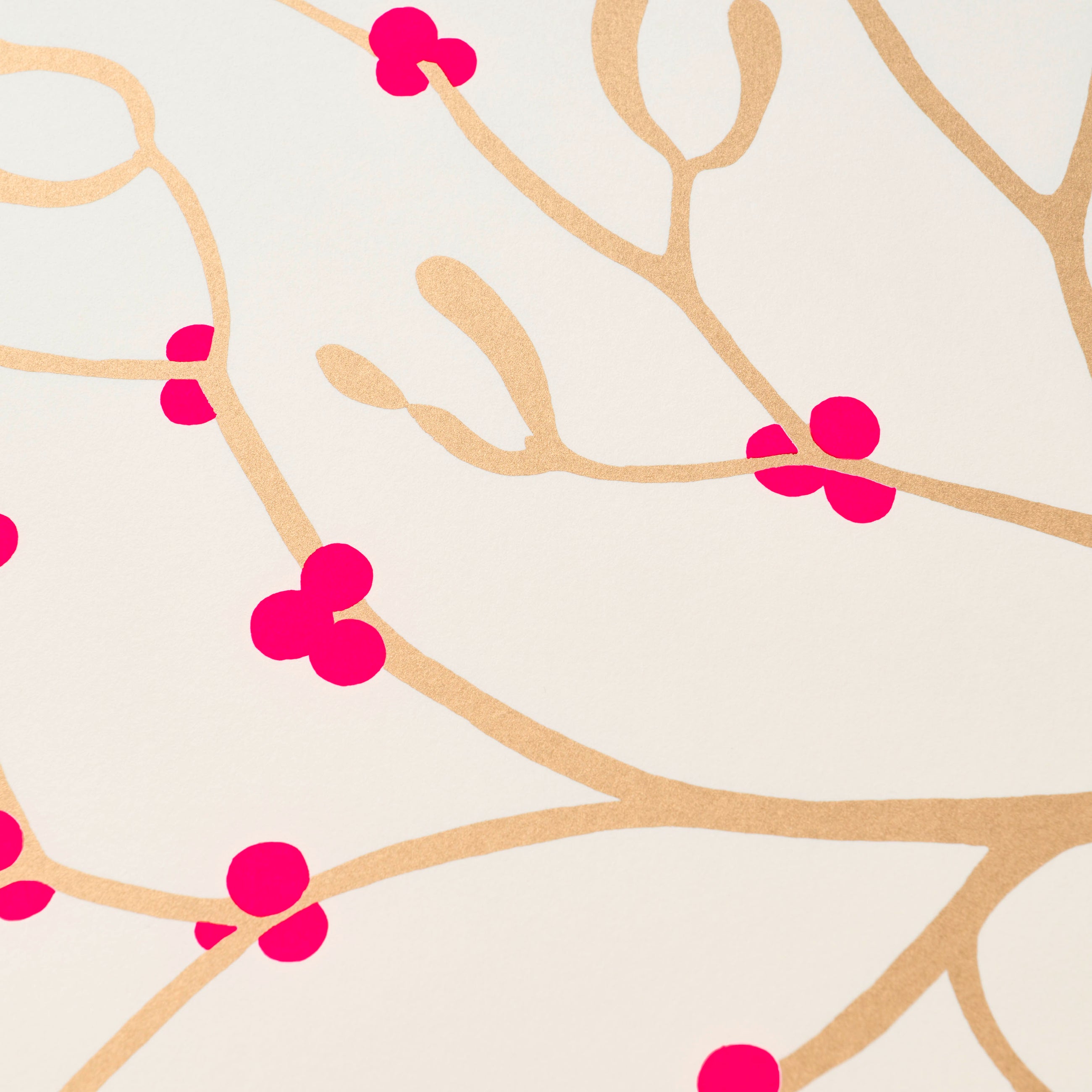Wrapping paper with a festive pattern of golden mistletoe branches accented by bright pink berries on a soft cream-white background.
