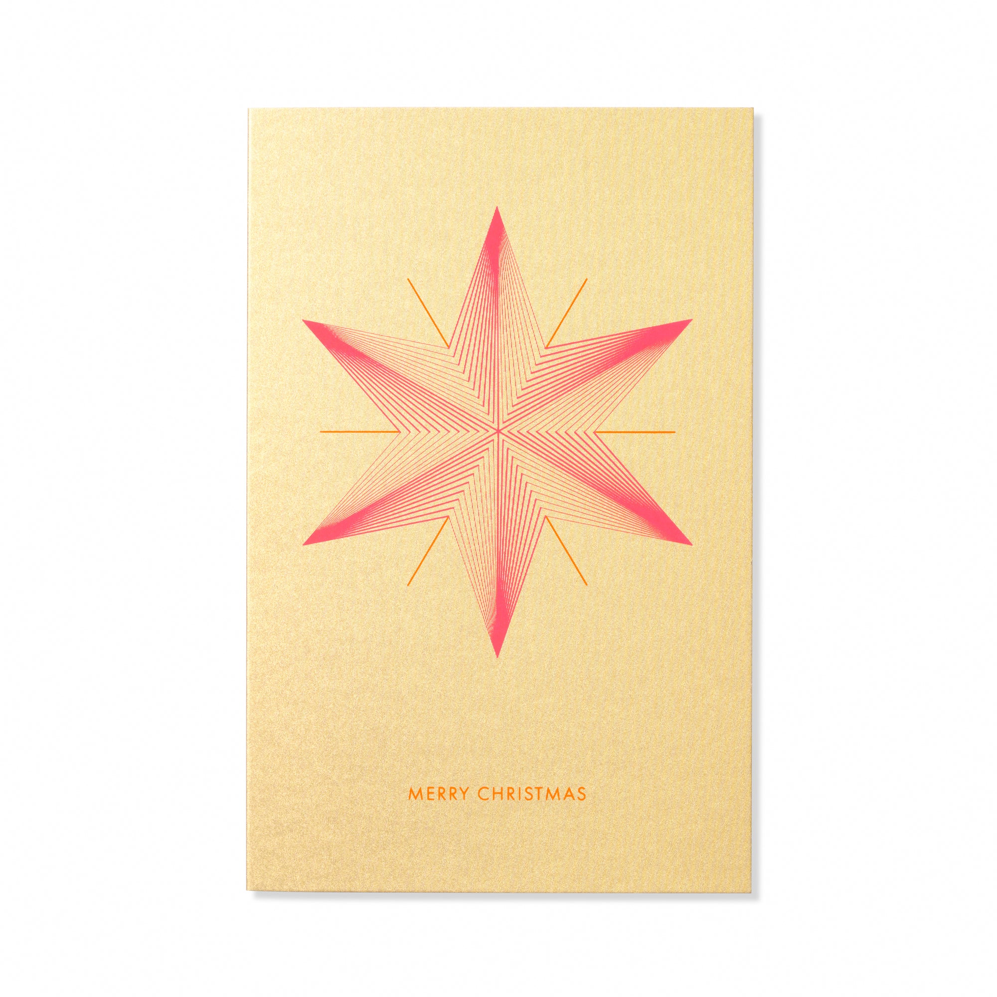 A gold Christmas card with a bold pink and orange geometric star design in the center and the text "MERRY CHRISTMAS" in orange at the bottom.
