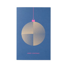 A dark blue Christmas card with a minimalist gold ornament design featuring fine geometric lines, a pink string and hook, and the text "MERRY CHRISTMAS" in pink at the bottom.