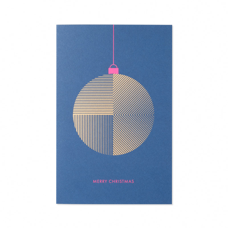 A dark blue Christmas card with a minimalist gold ornament design featuring fine geometric lines, a pink string and hook, and the text "MERRY CHRISTMAS" in pink at the bottom.