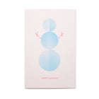 A light pink holiday card with a minimalist blue snowman made of three patterned circles, simple pink stick arms, and the text "HAPPY HOLIDAYS" in pink at the bottom.
