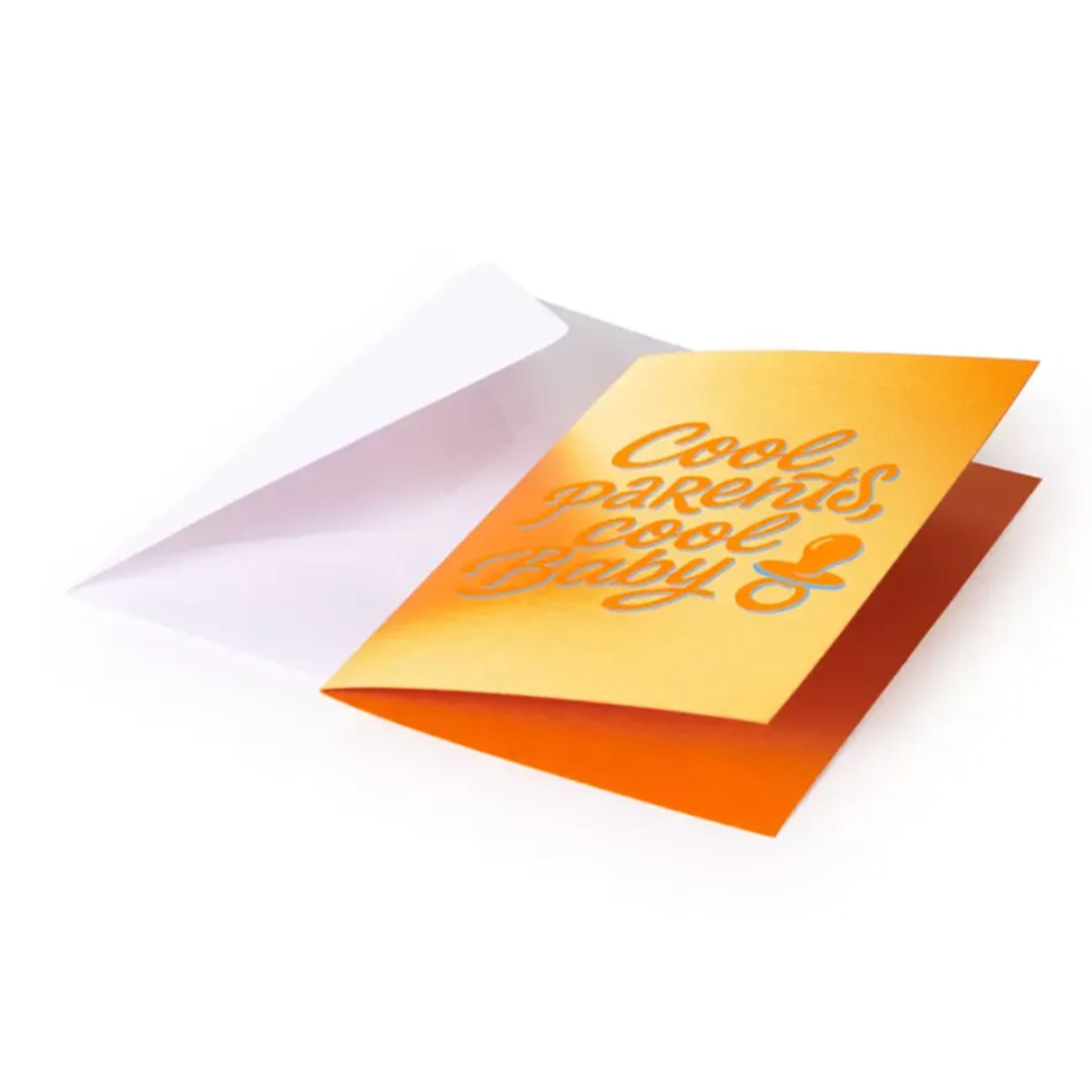 A vibrant greeting card with a warm golden-yellow background, featuring playful script lettering in bright orange with a soft blue shadow reading “Cool parents, cool baby,” alongside a small pacifier icon, tucked into a white envelope.