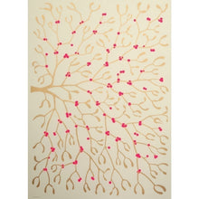 Ivory wrapping paper decorated with a branching mistletoe design in gold and accented with bright pink berries.