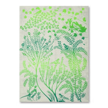 A light, textured wrapping paper featuring an all-over pattern of leafy plants and small birds, printed in layered shades of fresh green.
