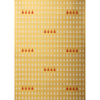 Gold wrapping paper patterned with rows of small white Christmas trees and clusters of red trees scattered throughout.