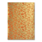 A gold-toned wrapping paper with a subtle metallic sheen, decorated with repeating citrus fruits, leaves, and sliced motifs in soft orange, creating an elegant yet cheerful design.