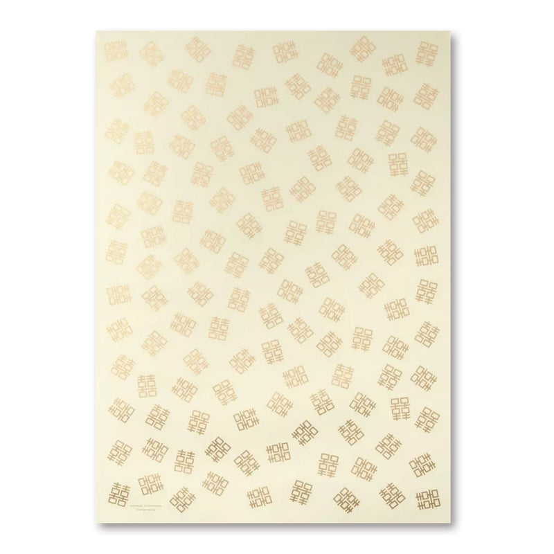 A cream-colored wrapping paper with a soft, matte finish, patterned with small copper double-happiness symbols scattered evenly across the surface in a subtle, elegant pattern.