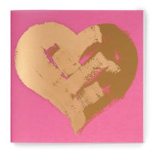 Greeting card with a saturated pink background, showcasing a large abstract gold heart with rough, painterly edges, presented straight-on against a clean white backdrop.