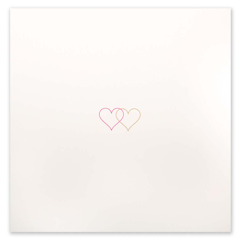An ivory greeting card shown flat with two small overlapping hearts in pink and gold set against a clean, minimal background.