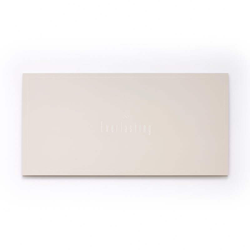 A flat beige card with a minimal border and the word “Everlasting” centered in delicate white lettering, topped by a small infinity symbol.