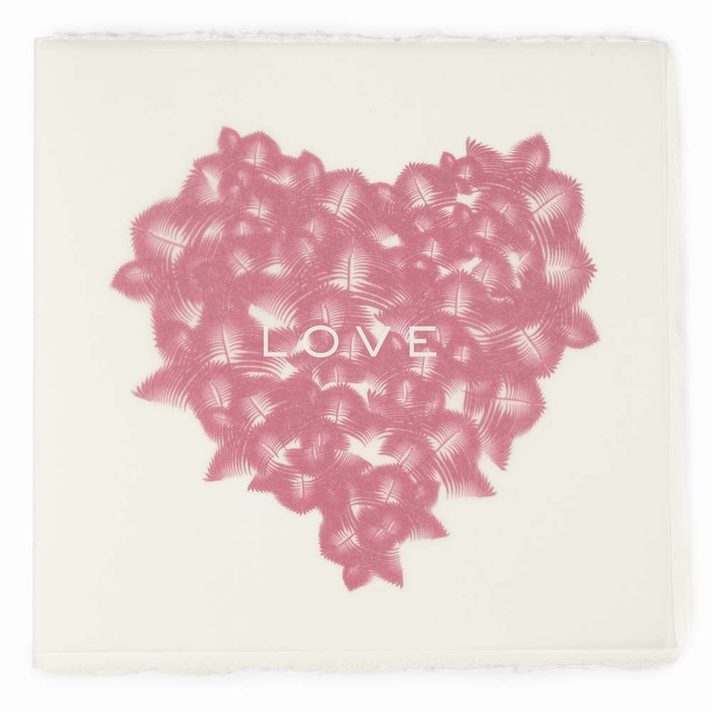 Greeting card with a refined artisanal style, featuring a soft pink feather-pattern heart centered on deckle-edged cream paper with the word “LOVE” subtly printed in white across the middle.