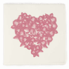 Greeting card with a refined artisanal style, featuring a soft pink feather-pattern heart centered on deckle-edged cream paper with the word “LOVE” subtly printed in white across the middle.