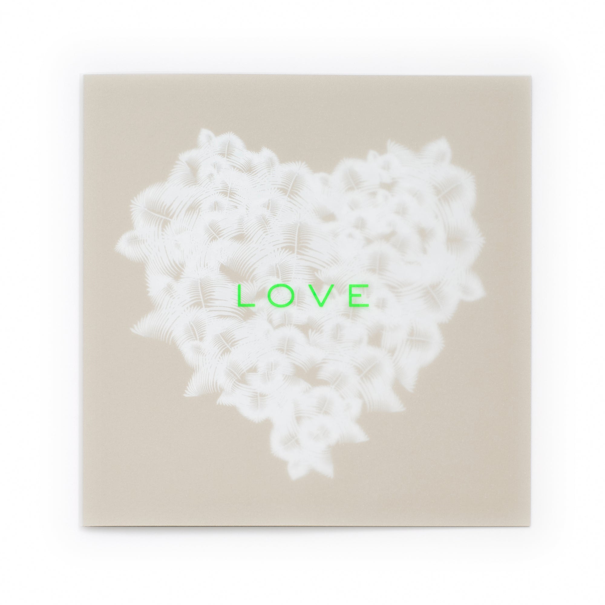 Greeting card with an elegant, understated design, featuring a textured white feather heart centered on a warm beige background, accented by bright neon-green “LOVE” text, shown flat against a clean white backdrop.