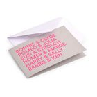 Greeting card with a minimalist design, featuring bold neon-pink text listing iconic couples on a soft grey background, shown partially open with a white envelope behind it.