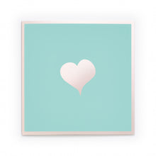 Greeting card with a minimalist design, featuring a soft blush-pink heart centered on a mint-green background framed by a subtle pale-pink border, presented straight-on with a calm, airy studio feel.