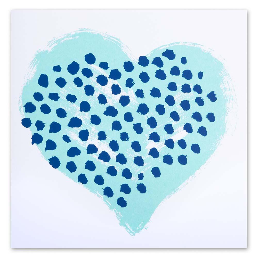 Greeting card with a minimalist design, featuring a painterly turquoise heart patterned with dark blue dots, centered on the card and shown straight-on.