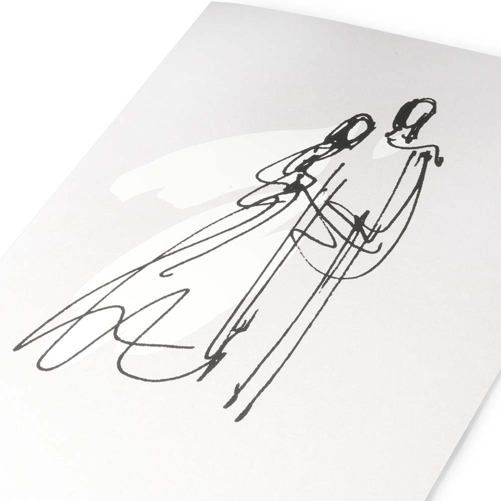 A close-up view of a pearly white card with a black, flowing line illustration of two figures leaning toward each other.