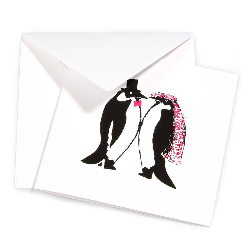 A folded greeting card shown with its envelope, featuring the same penguin wedding illustration centered on the front.