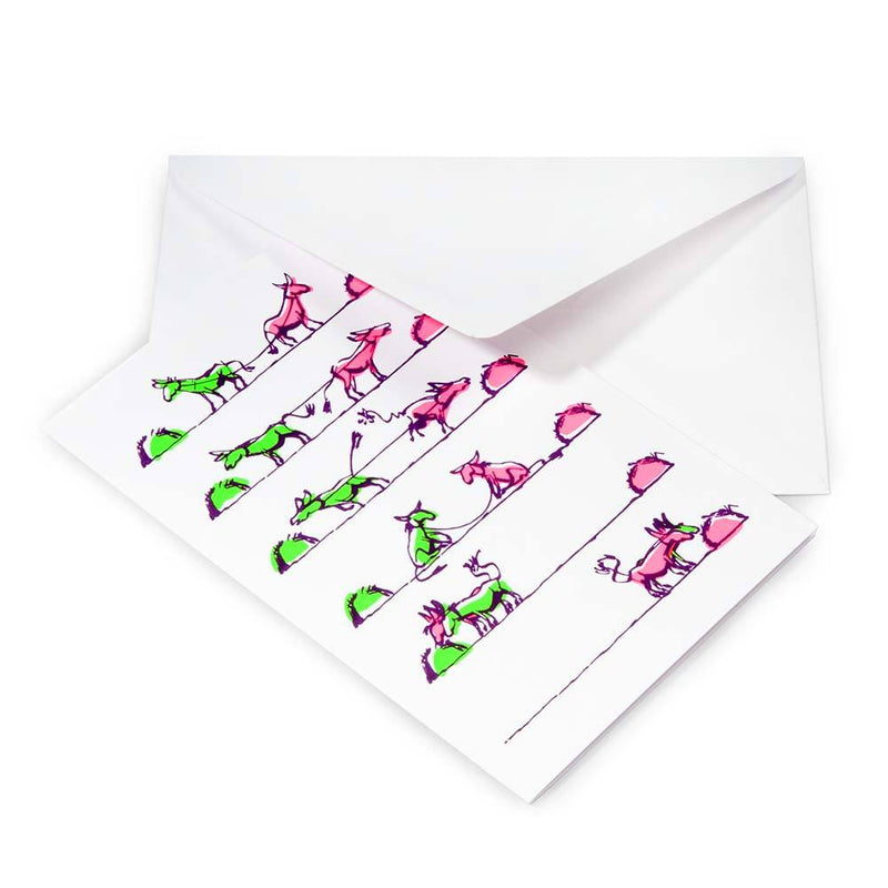 Greeting card partially pulled from a white envelope, showing a playful hand-drawn illustration of small animals in bright green and pink arranged in horizontal rows.