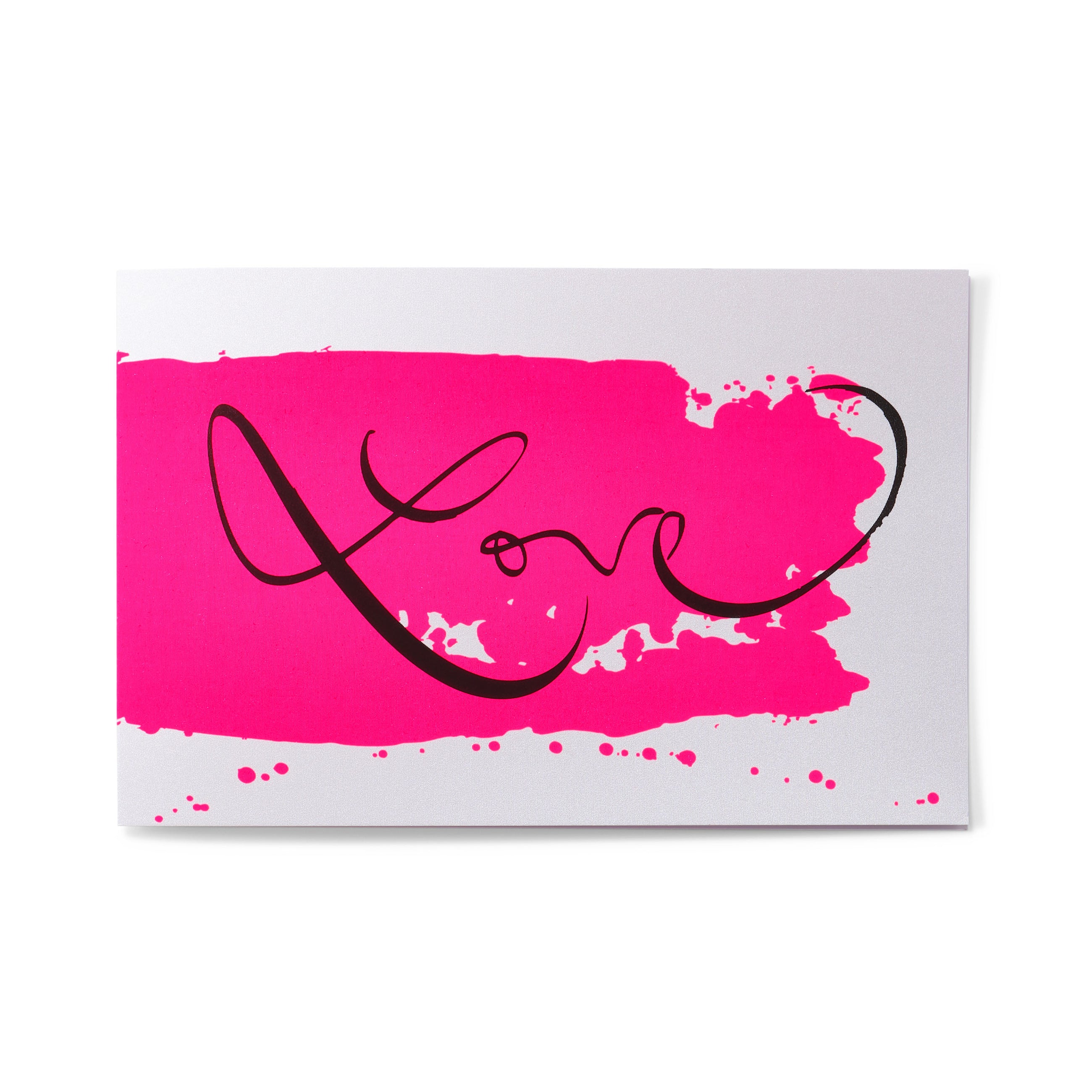 A white greeting card shown flat, centered with a bright pink brushstroke and the word “Love” written in smooth black calligraphic script.
