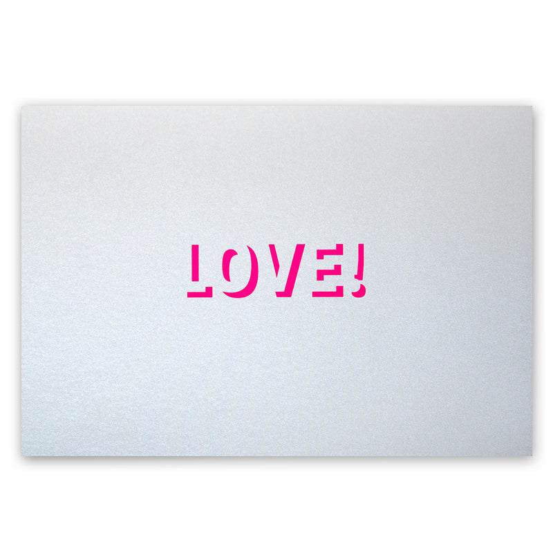 Silver greeting card with a smooth metallic surface and a centered pink “LOVE!” cutout.