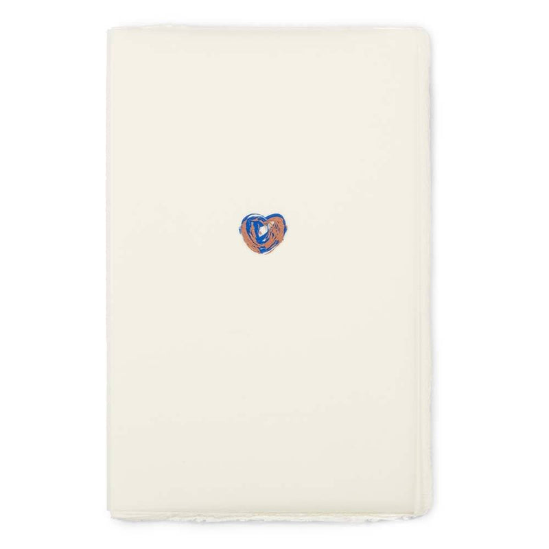 Greeting card with a minimalist design, featuring a small hand-painted heart in blue and copper tones centered on vertically oriented cream handmade paper, shown flat with deckled-edges.