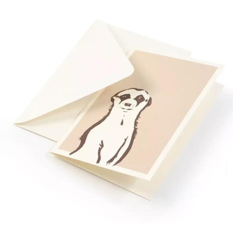 A minimalist greeting card with a warm beige background, featuring a simple, hand-drawn illustration of a meerkat in dark brown linework, standing upright with a calm, curious expression, tucked into a white envelope.