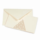 Elegant cream Christmas card decorated with a triangular pattern of small gold reindeer forming the shape of a Christmas tree, paired with a matching cream envelope.