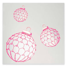 A shiny silver card with three neon pink Christmas baubles, modern and festive.
