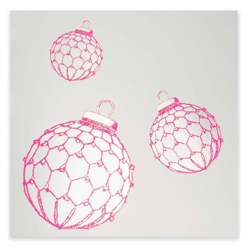 A shiny silver card with three neon pink Christmas baubles, modern and festive.