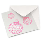A shiny silver card with three neon pink Christmas baubles, modern and festive, paired with a white envelope.