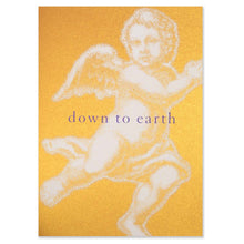 Elegant Christmas card with a shimmering gold-orange background, featuring a large pop-art-style white angel illustration and the text “down to earth.”