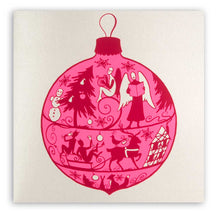 Christmas card with a bright pink ornament illustration filled with silhouettes of festive figures, animals, and decorations.