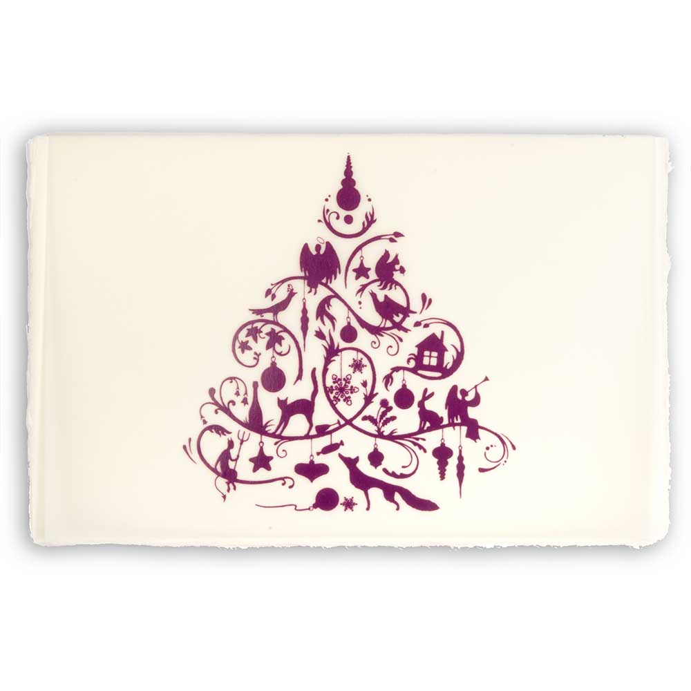 A cream-colored Christmas card with deckle edges, printed with a detailed purple ornamental design featuring festive silhouettes.