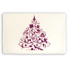 A cream-colored Christmas card with deckle edges, printed with a detailed purple ornamental design featuring festive silhouettes.
