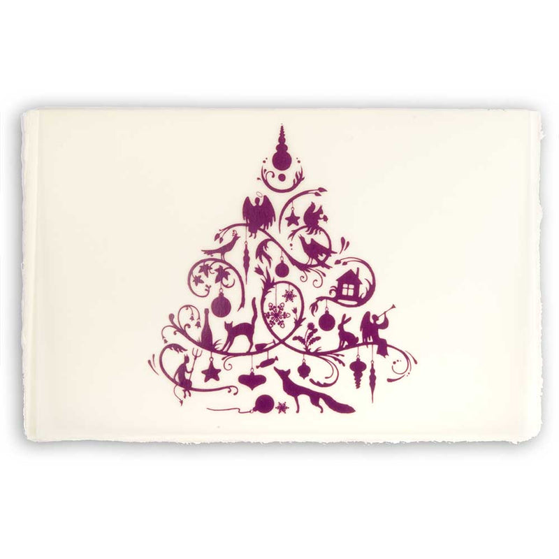 A cream-colored Christmas card with deckle edges, printed with a detailed purple ornamental design featuring festive silhouettes.