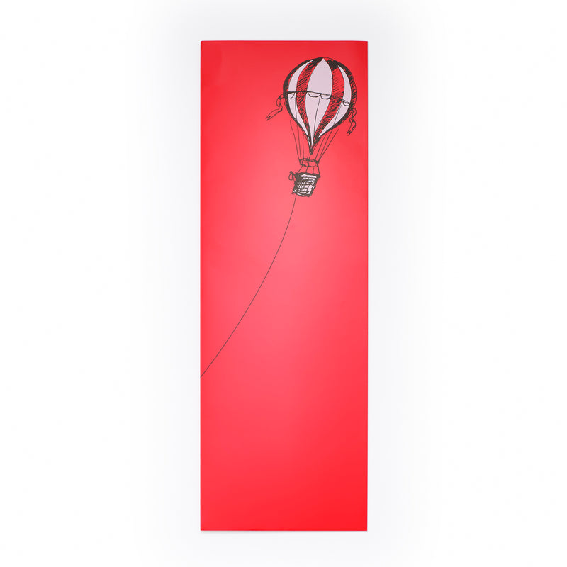 Christmas card with a bold red background, featuring a black illustration of a hot air balloon on the right, with a long rope extending left.