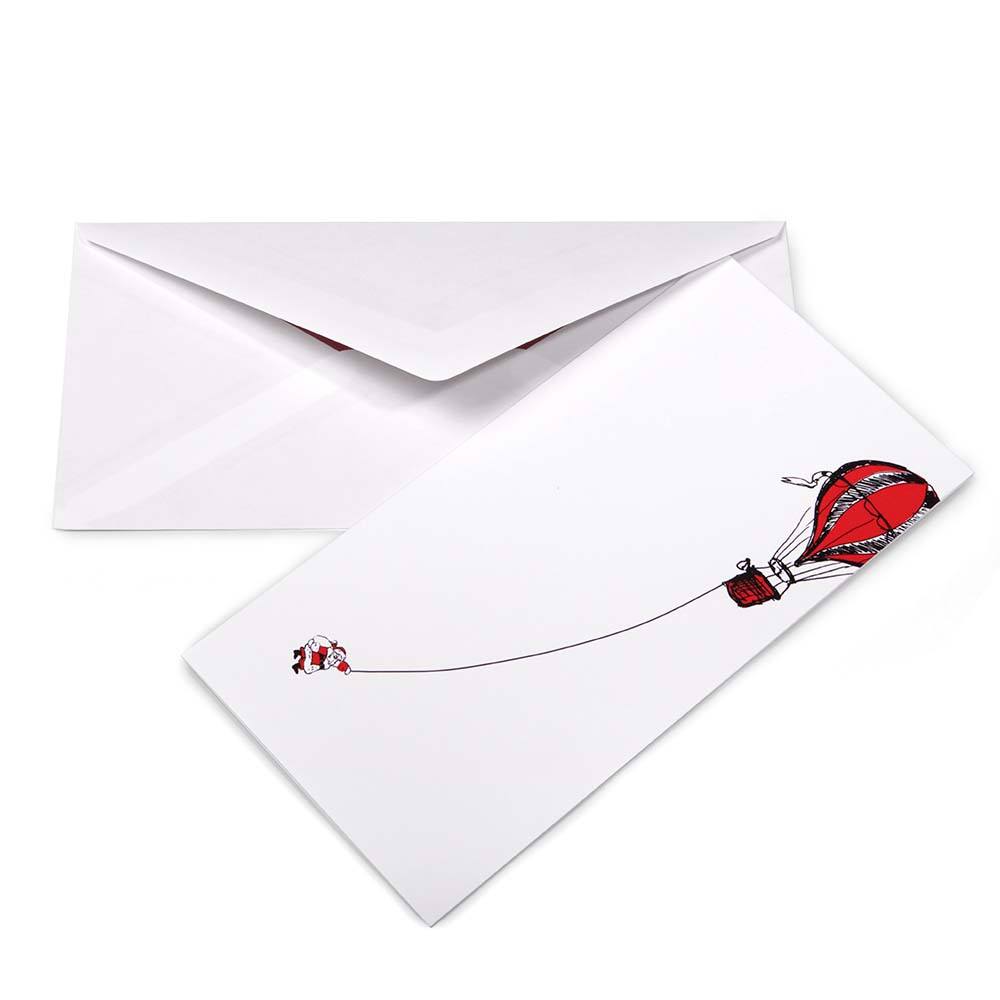 Minimalist Christmas card with a white background featuring an illustration of a red hot air balloon pulling Santa Claus hanging from a rope. Comes with a matching white envelope.