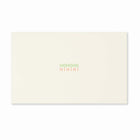 Minimalist cream-colored Christmas card with the words 'HOHOHO' in green and 'HIHIHI' in red printed in the center.