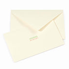 Minimalist cream-colored Christmas card with the words 'HOHOHO' in green and 'HIHIHI' in red printed in the center, paired with a matching cream envelope.