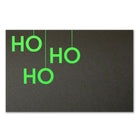 A black Christmas card with bold neon green letters arranged vertically to read "HO HO HO".
