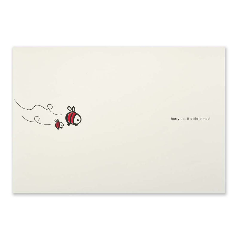 Whimsical cream Christmas card with two cartoon bees flying on the left and the text 'hurry up, it’s Christmas!' on the right.