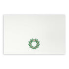White Christmas card featuring a green holly wreath with red berries.