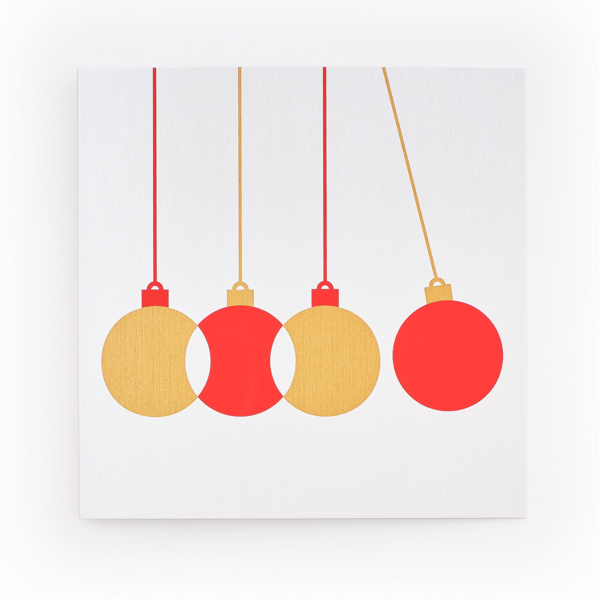 Minimalist Christmas card with four hanging ornaments in red and gold on a white textured background.