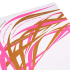 A close-up of a bright and abstract design with neon pink and gold lametta-style ribbons across the card, with text that reads "Merry Christmas & Happy New Year" in various languages.