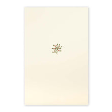 A cream-colored Christmas card with a small mistletoe sprig of olive leaves and pink berries in the center.